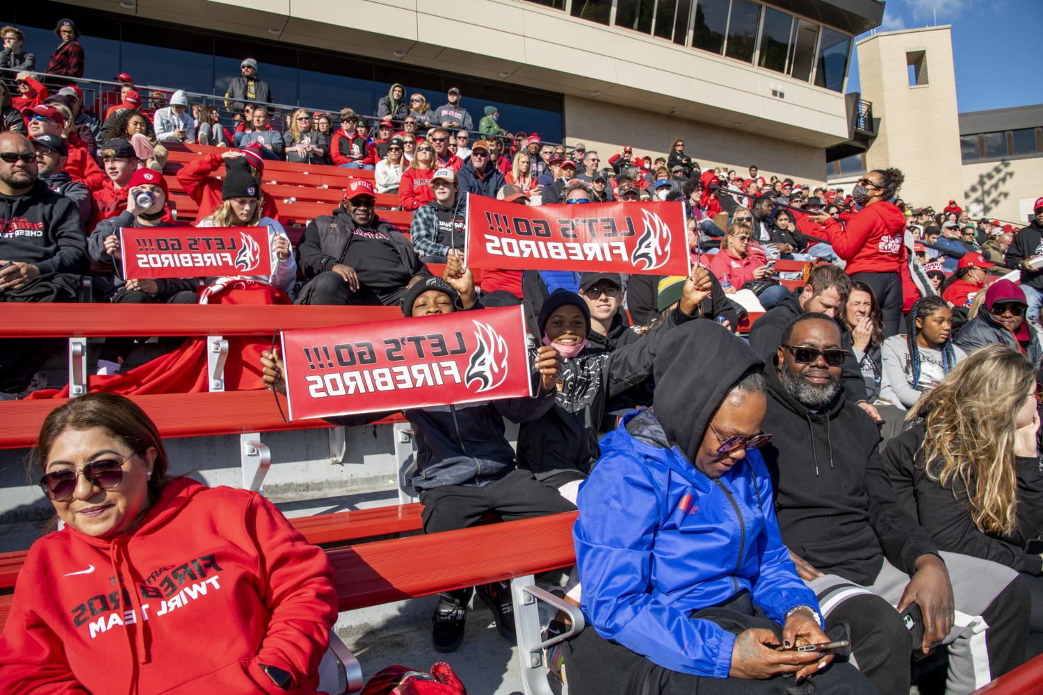 Firebirds fans cheer during the 2021 Homecoming football game.